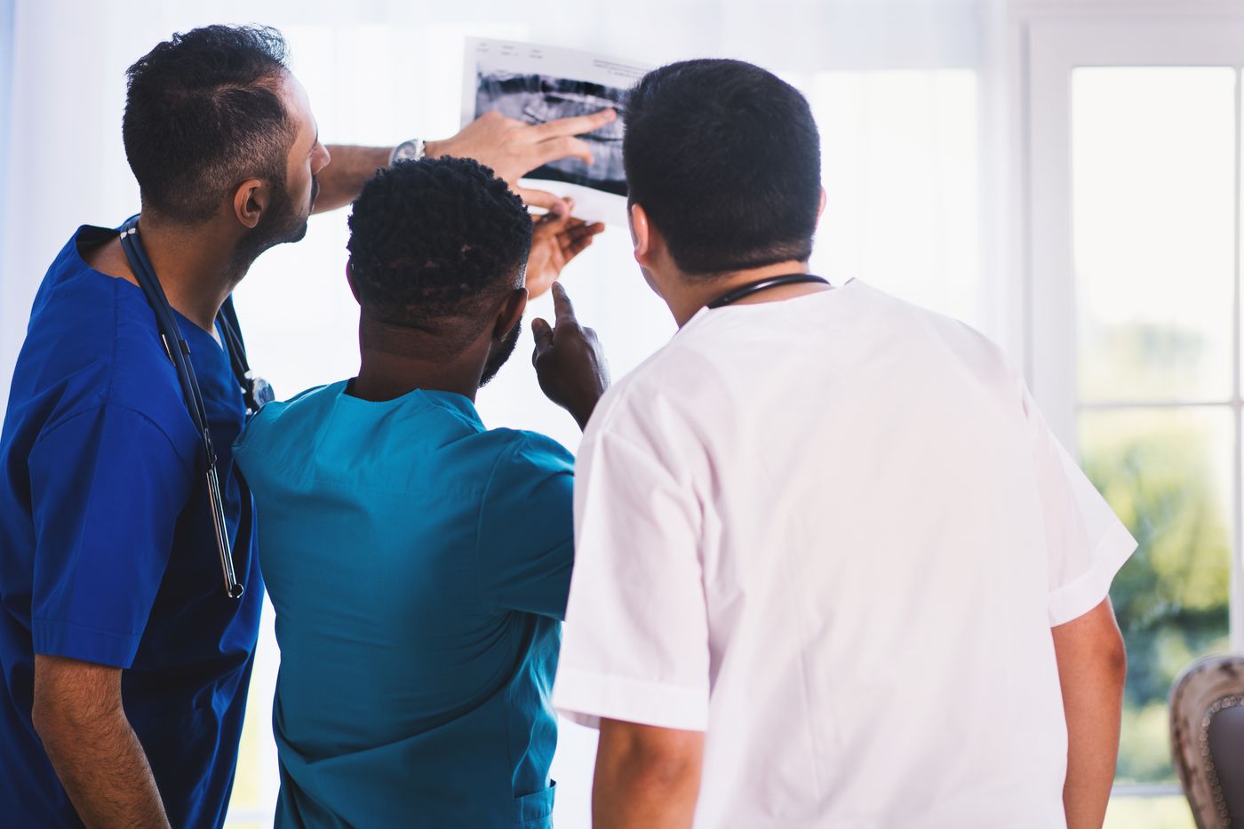 Physicians reviewing imaging together
